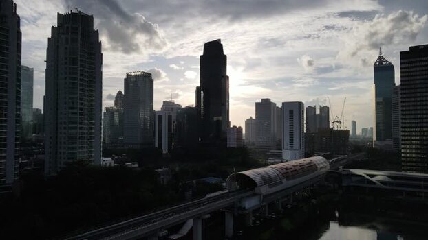 Aerial view of skyscrapers and a train station in Jakarta Indonesia. Aerial view of skyscrapers and a train station in Jakarta Indonesia.