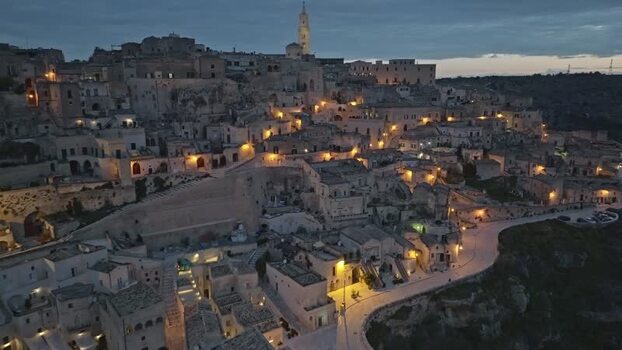 Aerial view of Sassi di Matera at dusk in Matera Italy.