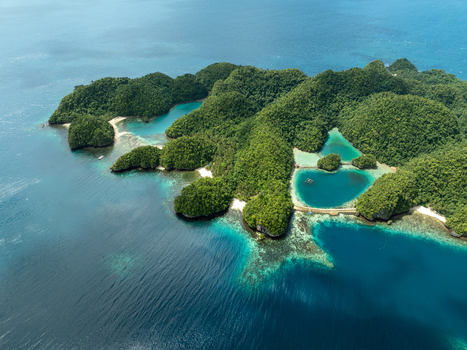 Aerial view of Bucas Grande featuring lush green islands turquoise lagoons and clear blue water in Siargao Philippines. Aerial view of Bucas Grande featuring lush green islands turquoise lagoons and clear blue water in Siargao Philippines.