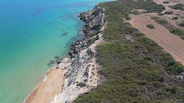 Aerial view of coastal cliffs and turquoise water Northern Cyprus.