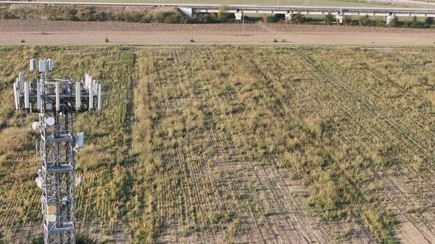 Aerial view of telecommunications tower near motorway Italy. Aerial view of telecommunications tower near motorway Italy.