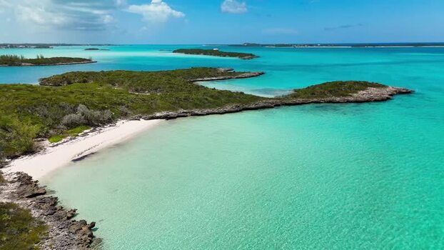 Aerial view of Crab Cay and turquoise waters The Bahamas.