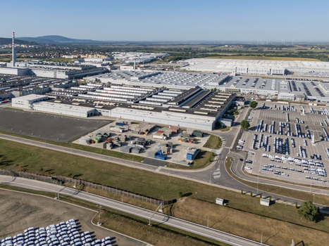 Aerial view of the Volkswagen Slovakia factory in Devinska Nova Ves featuring large industrial buildings and extensive car parking lots Bratislava Bratislavsky kraj Slovakia. Aerial view of the Volkswagen Slovakia factory in Devinska Nova Ves featuring large industrial buildings and extensive car parking lots Bratislava Bratislavsky kraj Slovakia.