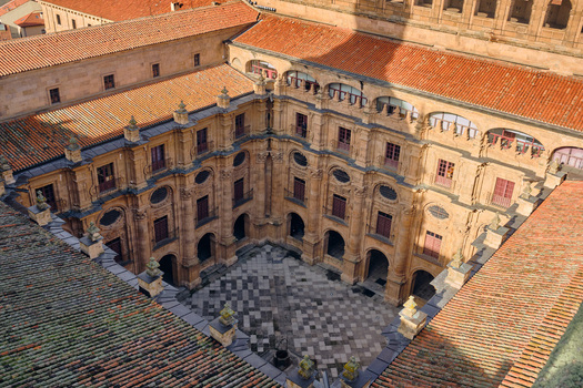 Salamanca Spain 01 December 2025 View of the ornate courtyard of the Pontifical University of Salamanca with baroque stone facades and red tiled roofs. Salamanca Spain 01 December 2025 View of the ornate courtyard of the Pontifical University of Salamanca with baroque stone facades and red tiled roofs.