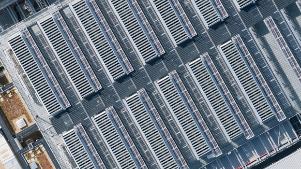 Aerial view of the Equinix Data Center featuring rows of industrial cooling units and technical infrastructure on the rooftop in Frankfurt am Main Hessen Germany.