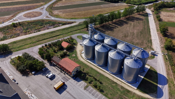 Aerial view of the storage silo in Bavaniste surrounded by agricultural fields and rural infrastructure in Bavaniste Vojvodina Serbia.
