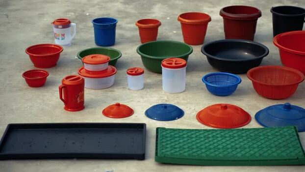 View of colorful plastic household containers and buckets Bangladesh. View of colorful plastic household containers and buckets Bangladesh.