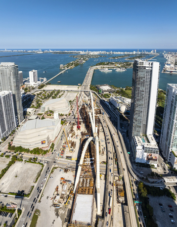 Aerial view of the vibrant cityscape with the scenic Biscayne Bay and MacArthur Causeway stretching into the horizon Miami Florida USA. Aerial view of the vibrant cityscape with the scenic Biscayne Bay and MacArthur Causeway stretching into the horizon Miami Florida USA.