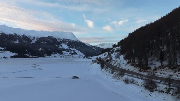 Aerial view of frozen Reschensee in Graun im Vinschgau Italy. Aerial view of frozen Reschensee in Graun im Vinschgau Italy.