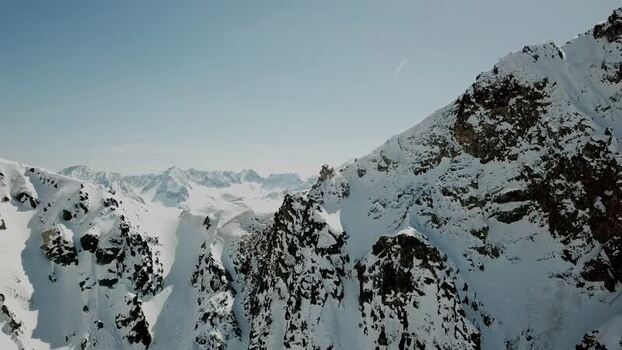 Aerial view of snowy mountain peaks in the Pyrenees Spain.