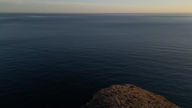Aerial view of the Moraira coastline at sunset Spain.