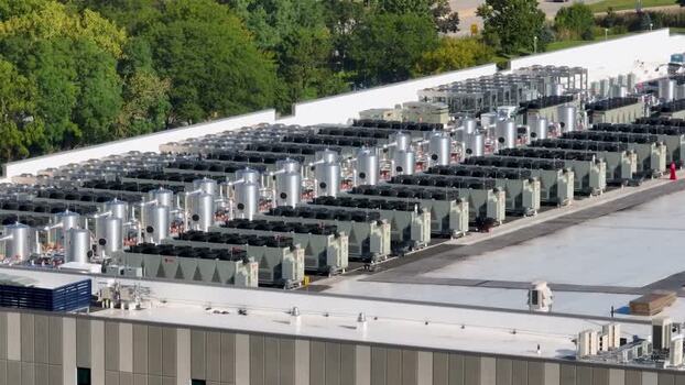 Aerial view of data center cooling systems in United States. Aerial view of data center cooling systems in United States.
