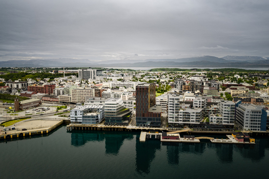 Aerial view of the modern waterfront architecture and harbor in the city of Bodo Nordland Norway. Aerial view of the modern waterfront architecture and harbor in the city of Bodo Nordland Norway.