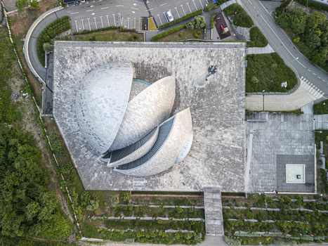 Rijeka Croatia 18 May 2025 Aerial view of the Islamic Center of Rijeka featuring its modern architecture with segmented dome structures stone courtyard and surrounding greenery. Rijeka Croatia 18 May 2025 Aerial view of the Islamic Center of Rijeka featuring its modern architecture with segmented dome structures stone courtyard and surrounding greenery.