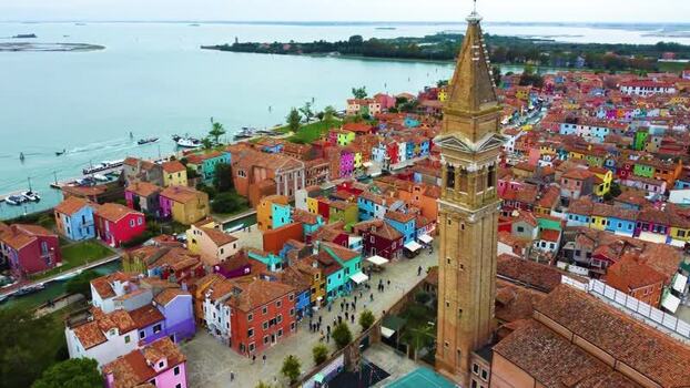 Aerial view of Burano and its leaning bell tower Italy.
