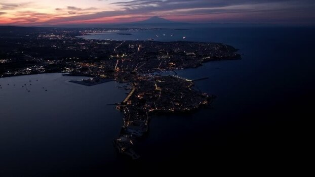 Aerial view of Island of Ortigia at dusk in Syracuse Italy. Aerial view of Island of Ortigia at dusk in Syracuse Italy.