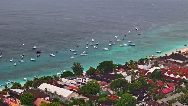 Aerial view of coastal town and boats in Bali Indonesia.