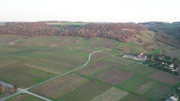Aerial view of church and fields France.