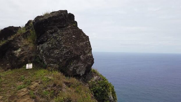 View of ocean and cliffside rock Pitcairn Islands.