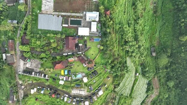 Aerial view of Joglo Java Neglasari resort in Indonesia. Aerial view of Joglo Java Neglasari resort in Indonesia.
