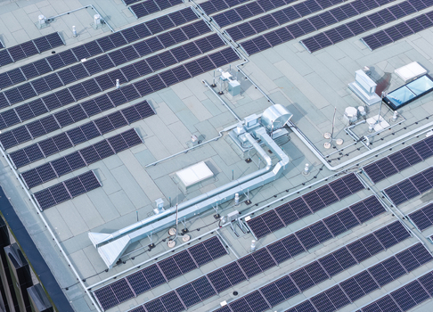 Aerial view of solar panels installed on the flat roof of the Poznan University of Technology Warta Campus in Poznan Greater Poland Voivod Poland. Aerial view of solar panels installed on the flat roof of the Poznan University of Technology Warta Campus in Poznan Greater Poland Voivod Poland.