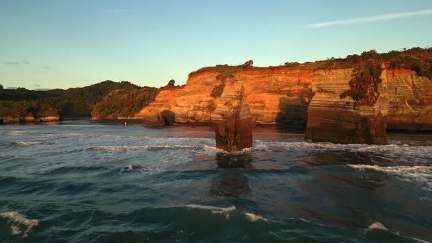 Aerial view of Clifton Road cliffs and sea stacks New Zealand.