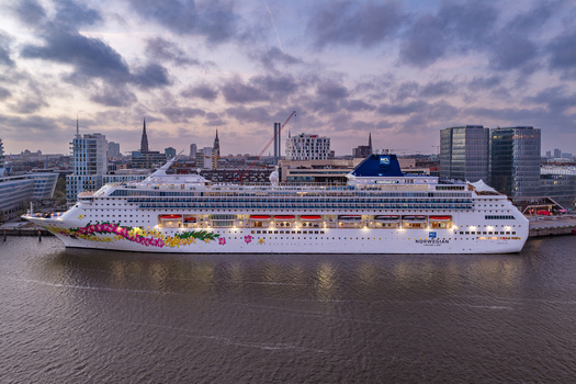 Hamburg Germany 23 April 2026 Aerial view of a large cruise ship docked at the Cruise Center HafenCity terminal under a cloudy sky at dusk. Hamburg Germany 23 April 2026 Aerial view of a large cruise ship docked at the Cruise Center HafenCity terminal under a cloudy sky at dusk.