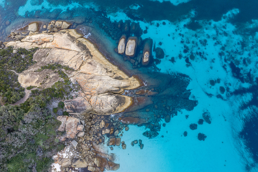 Aerial view of the turquoise waters and granite rock formations of Frenchman Bay in Albany Western Australia Australia. Aerial view of the turquoise waters and granite rock formations of Frenchman Bay in Albany Western Australia Australia.