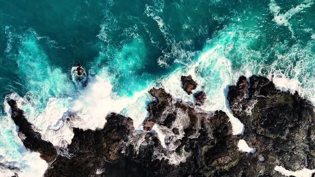 Aerial view of Kalaemamo coastline and turquoise waves United States.