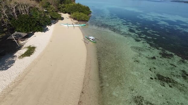 FPV aerial view of Pass Island beach in Philippines. FPV aerial view of Pass Island beach in Philippines.