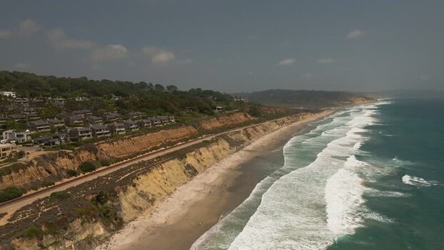 Aerial view of the rugged coastline and sandy beach United States.