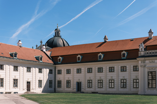 View of Belvedere Palace featuring its baroque architecture white facade and red tiled roofs under a clear blue sky in Vienna Vienna Austria. View of Belvedere Palace featuring its baroque architecture white facade and red tiled roofs under a clear blue sky in Vienna Vienna Austria.