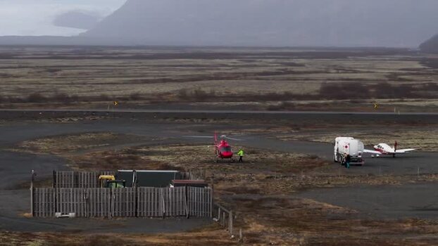 Aerial view of helicopter on landing strip in Iceland. Aerial view of helicopter on landing strip in Iceland.