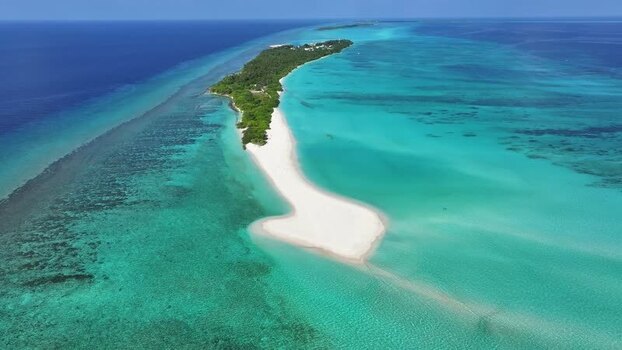 Aerial view of a tropical island with white sand beaches Maldives. Aerial view of a tropical island with white sand beaches Maldives.