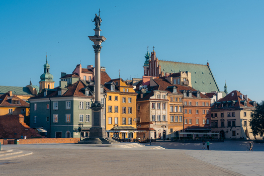 View of Sigismund s Column in the historic Castle Square surrounded by colorful architecture in Warsaw Masovian Voivodeship Poland. View of Sigismund s Column in the historic Castle Square surrounded by colorful architecture in Warsaw Masovian Voivodeship Poland.