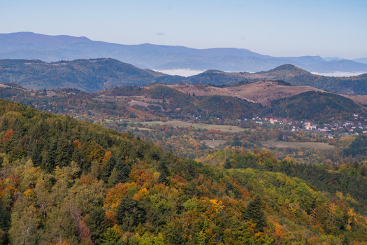 Aerial view of Sitno mountain surrounded by colorful autumn forests and rolling hills in Ilija Banska Bystrica Region Slovakia. Aerial view of Sitno mountain surrounded by colorful autumn forests and rolling hills in Ilija Banska Bystrica Region Slovakia.
