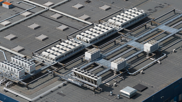 Aerial view of the industrial cooling units and HVAC systems on the rooftop of NorthC Datacenters Nieuwegein Utrecht Netherlands. Aerial view of the industrial cooling units and HVAC systems on the rooftop of NorthC Datacenters Nieuwegein Utrecht Netherlands.