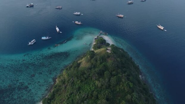 Aerial view of Pulau Kelor with boats in Indonesia. Aerial view of Pulau Kelor with boats in Indonesia.