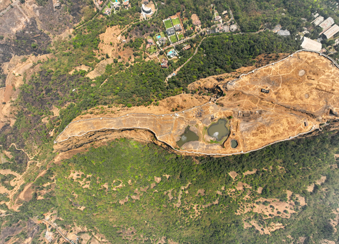 Aerial view of Korigad Fort with its historic fortifications stone walls and water reservoirs on the plateau surrounded by lush green hills in Peth Shahapur Maharashtra India. Aerial view of Korigad Fort with its historic fortifications stone walls and water reservoirs on the plateau surrounded by lush green hills in Peth Shahapur Maharashtra India.