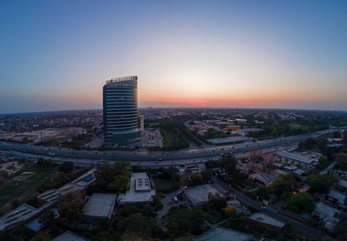 Aerial view of the Arfa Kareem Tower and the urban skyline during sunset in Lahore Punjab Pakistan. Aerial view of the Arfa Kareem Tower and the urban skyline during sunset in Lahore Punjab Pakistan.