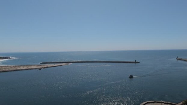 Aerial view of the Douro River mouth and breakwater in Porto Portugal. Aerial view of the Douro River mouth and breakwater in Porto Portugal.