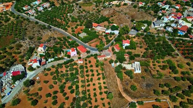 Aerial view of olive groves and rural houses in Crete Greece.