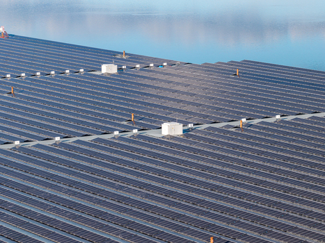 Aerial view of the floating solar park at Cottbuser Ostsee a former open pit mine showing repair works on the solar panels after storm damage in Cottbus Brandenburg Germany. Aerial view of the floating solar park at Cottbuser Ostsee a former open pit mine showing repair works on the solar panels after storm damage in Cottbus Brandenburg Germany.