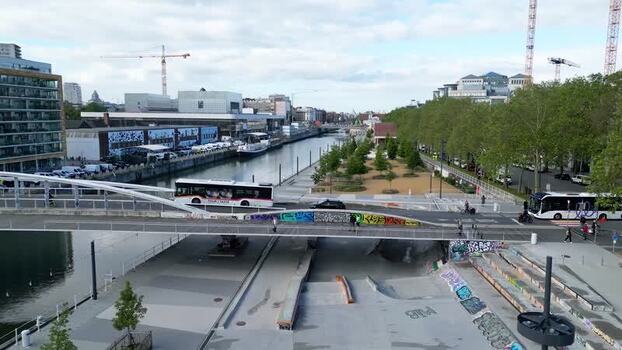 Aerial view of a bus crossing a bridge over a canal Belgium.
