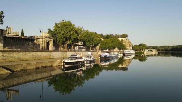 Aerial view of boats moored along the river Loire in Nevers France. Aerial view of boats moored along the river Loire in Nevers France.