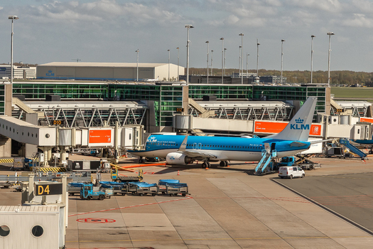 Schiphol Netherlands 16 April 2026 View of a KLM Royal Dutch Airlines airplane parked at the terminal gate with ground support equipment and airport infrastructure. Schiphol Netherlands 16 April 2026 View of a KLM Royal Dutch Airlines airplane parked at the terminal gate with ground support equipment and airport infrastructure.
