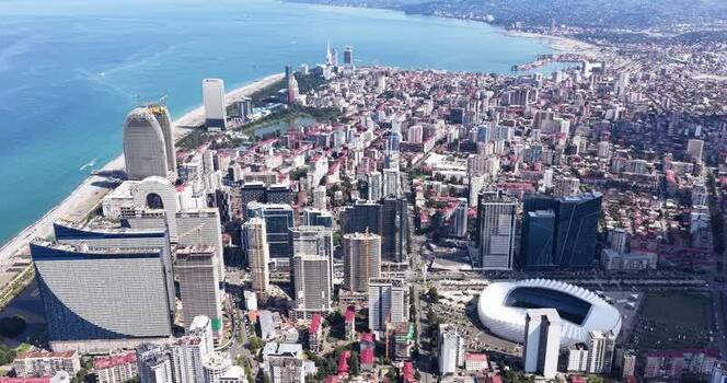 Aerial view of modern skyscrapers and stadium in Batumi Georgia. Aerial view of modern skyscrapers and stadium in Batumi Georgia.