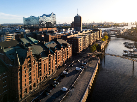 Aerial view of the historic Speicherstadt warehouse district and the modern Elbphilharmonie concert hall along the canals in Hamburg Hamburg Germany.