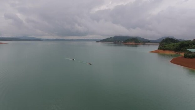 Aerial view of Batang Ai lake with boats in Lubok Antu Malaysia. Aerial view of Batang Ai lake with boats in Lubok Antu Malaysia.