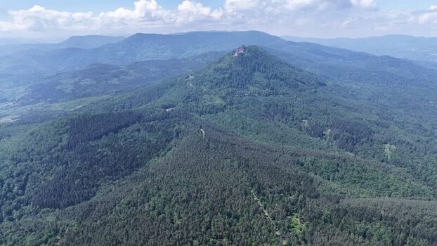 Aerial view of forested mountains and peaks near Selestat France.